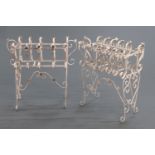 A pair of rectangular wrought iron garden planters, with floral and scroll decoration.