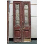 A pair of North African painted pine doors,