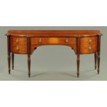 A Regency mahogany inverted bowfront sideboard, with boxwood and ebony stringing,