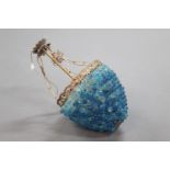 A metal and glass ceiling hanging light fitting, decorated with blue globules. Height +/- 46 cm.