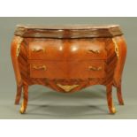 A French style marble topped bombe commode, kingwood with metal mounts. Width 122 cm.