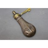 Copper and brass powder flask, with Dicksons basket pattern with leaves. 20 cm.