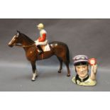 Beswick standing horse and jockey Model 1862, and a Royal Doulton "The Jockey" character jug.