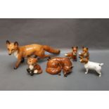 Beswick, 7 figures (6 foxes and a terrier) to include Model No. 1733 Comical Fox.