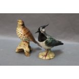 Beswick lapwing Model 2416, with split wing and tail feathers, and a thrush Model 2308.