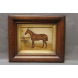 A late 19th century oil portrait of a bay horse in stable,