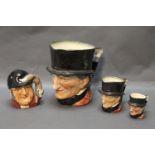 Four Royal Doulton character jugs, three graduated John Peel and another titled "Gone Away".