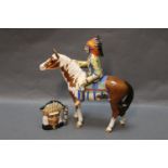 Beswick mounted Indian or native American, and a Royal Doulton North American Indian character jug.