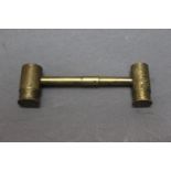 Double ended brass powder and shot measure. 10.5 cm.