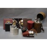 five hip flasks, 3 sets of stainless steel cups and triple travelling drinks holder.
