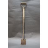 A vintage mole spade, for setting mole traps. Length 81 cm.