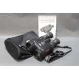 A pair of Canon 18 x 50 IS UD image stabiliser all weather binoculars, with case and instructions.