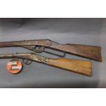 Two BB guns, (Ucton Model 40 patented June 30th 1914 and a Milbro Scout),
