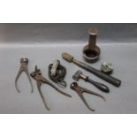 A collection of reloading and other equipment, to include three bullet moulds,