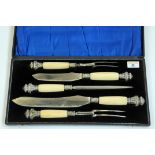 Cased carving set with ivorine handles and silver plated mounts