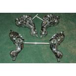 4 modern silver coloured ball and claw bath feet