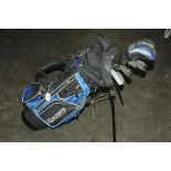 Child's golf clubs with bag