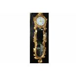 Gilt framed wall clock with combined mirror