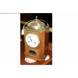 Oak cased bracket clock with silver plated bell, key and pendulum,