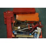 Box of toolboxes, sharpening stone, hot glue sticks, clamps, etc.