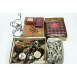 4 boxes of cutlery, mink stole, vintage Scottish tartan tea cosy, money boxes, razor, cutlery etc.