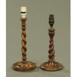 Two oak twist column candlesticks, converted to electricity. Height excluding light fitting 33 cm.