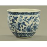 A Chinese Kangxi blue and white bowl, decorated with birds,