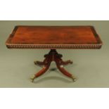 A William IV mahogany rosewood banded breakfast table, with lobed edge,