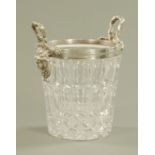 A large cut glass champagne bucket, with silver plated mounts and carrying handles. Height 27.