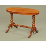 A Victorian mahogany oval stretcher table, with moulded edge,