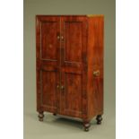 A Regency/William IV mahogany campaign two part cabinet,