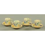 A set of four royal Doulton Brangwyn Ware coffee cans and saucers,