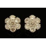 A pair of 18 ct white gold diamond cluster earrings, set with diamonds weighing +/- 2.
