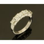 An 18 ct white gold five stone half eternity ring,