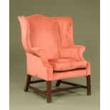 A George III style wing easy chair,