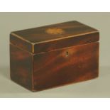 A George III inlaid mahogany tea caddy, with two interior compartments. Width 18.5 cm.
