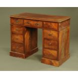 A Victorian mahogany pedestal desk or dressing table, with moulded edge and rounded corners,