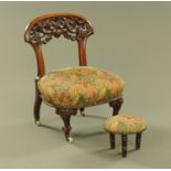 A Victorian walnut nursing chair,