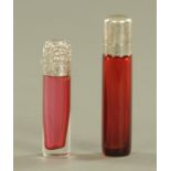 A silver mounted cranberry glass scent bottle, with repousse top, Birmingham 1901,