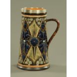 A Doulton Lambeth stoneware jug, with silver mount dated 1879, maker Hukin & Heath,