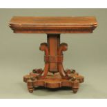 A 19th century rosewood turnover top tea table,