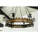 A large copper and wrought iron coronet hall light fitting, six branch, with suspension chains.