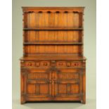 A Titchmarsh & Goodwin oak dresser, retailed by Chapman's Siesta, Carlisle. Width 123 cm.