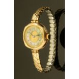 A vintage gold wristwatch with mother of pearl dial with Arabic numerals, 9 ct with plated bracelet,