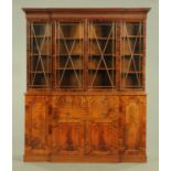 A George III style mahogany breakfront library bookcase,