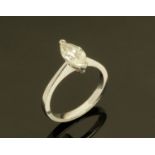 An 18 ct white gold Solitaire ring, set with a Marquis cut diamond weighing +/- 1.50 carats.