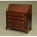 A George III mahogany bureau,