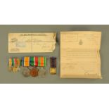 A Merchant Navy medal group to Laurence Rhodes, together with miniatures and accompanying paperwork.