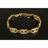 A 9 ct gold Coco Chanel style diamond set bracelet, 17.6 grams (see illustration).