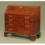 A George III mahogany bureau,